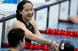 lol官网-日本运动员在游泳比赛中刷新世界纪录